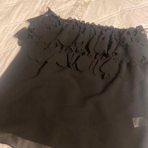 Black strapless top with cutout detail